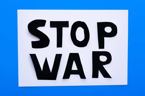 Κάτοψη Του Stop War Lettering Λευκό Και Μπλε Φόντο — Φωτογραφία Αρχείου