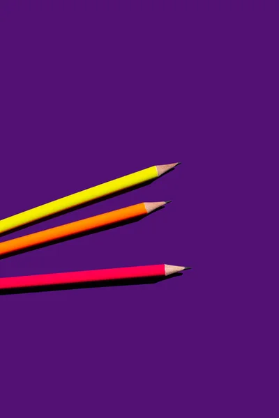 Top View Colorful Pencils Purple Background — стоковое фото