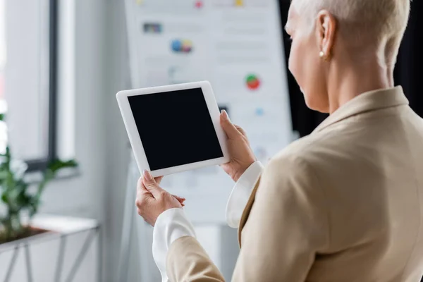 Blurred Banker Holding Digital Tablet Blank Screen Office — Zdjęcie stockowe