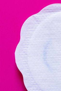 close up of breathable panty liner on purple background, top view