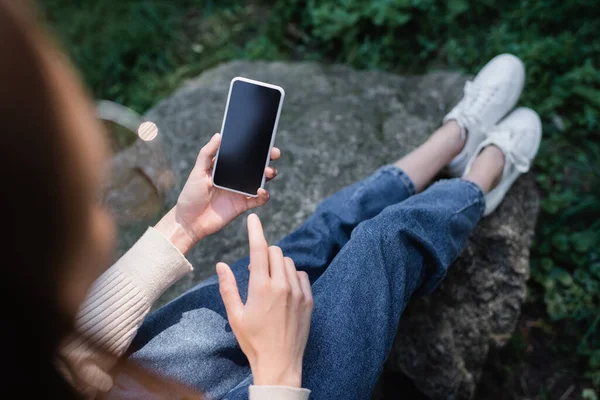 High Angle View Woman Holding Smartphone Blank Screen Sitting Stone — Stock Photo, Image