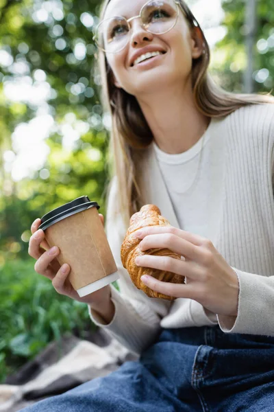 Low Angle View Happy Woman Glasses Holding Paper Cup Croissant — Stok fotoğraf