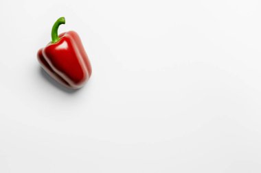 Top view of red bell pepper on white background  clipart