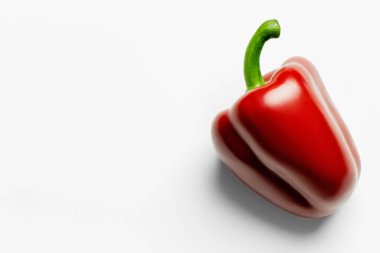 Top view of ripe paprika on white background 
