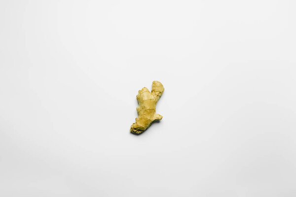 Top view of ripe ginger on white background 