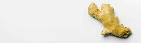 Top view of ripe ginger on white background, banner 