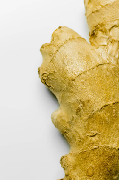Close up view of ripe ginger on white background 