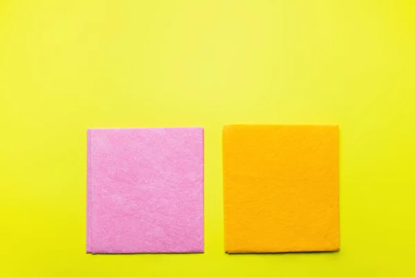 Top View Bright Pink Orange Dishrags Yellow Background — Stockfoto