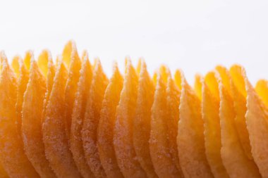 top view of salty and crunchy potato chips isolated on white