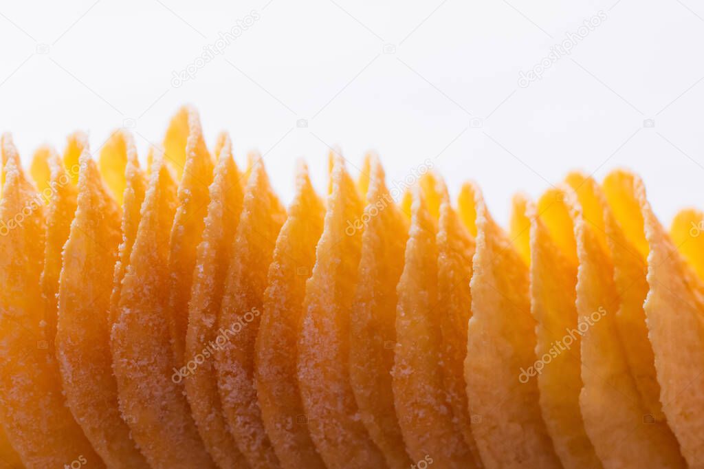 top view of salty and crunchy potato chips isolated on white