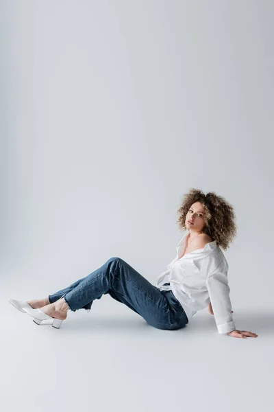 Stylish Woman Sitting White Background — Stock Photo, Image