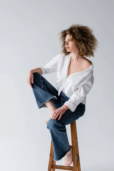 Young Curly Barefoot Model Posing Chair Isolated White — Stock Photo, Image