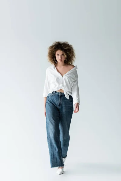 Curly Woman Blouse Walking White Background — Stock Photo, Image