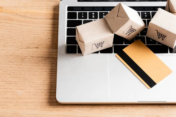 Top View Credit Card Packages Laptop Table — Stock Photo, Image