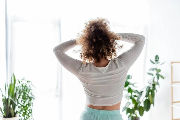 Back View Curly Woman White Homewear Stretching Morning Home — Stock Photo, Image