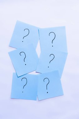 top view of blue cards with question marks on white background clipart