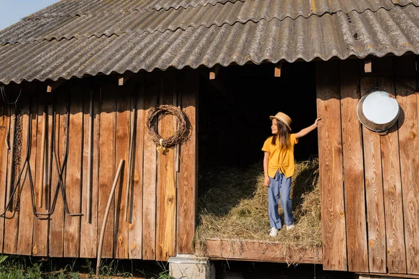 Full Length Girl Standing Hey Wooden Barn Looking Away — Stock Photo, Image