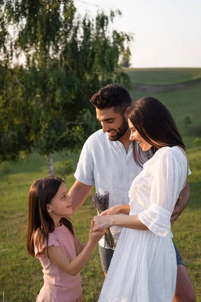 Happy Couple Looking Daughter Countryside Summer Day — 스톡 사진