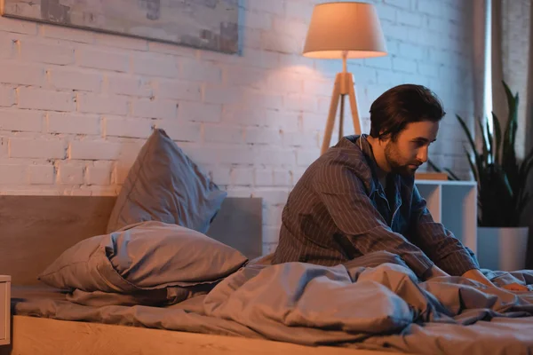Bearded Man Sitting Bed While Suffering Sleep Disorder Night — Stock Fotó