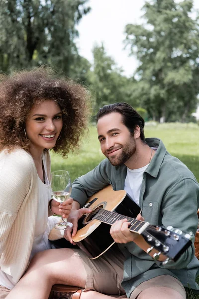 Romantic Man Playing Acoustic Guitar Smiling Woman Glass Wine Picnic — Stock Photo, Image