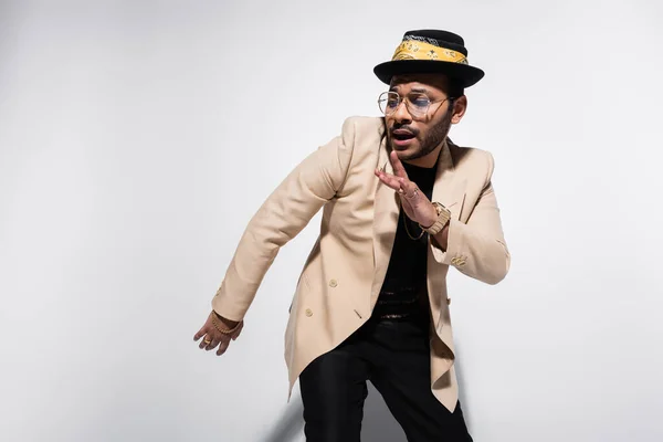 Eastern Hip Hop Performer Fedora Hat Eyeglasses Looking Away Gesturing — Foto de Stock