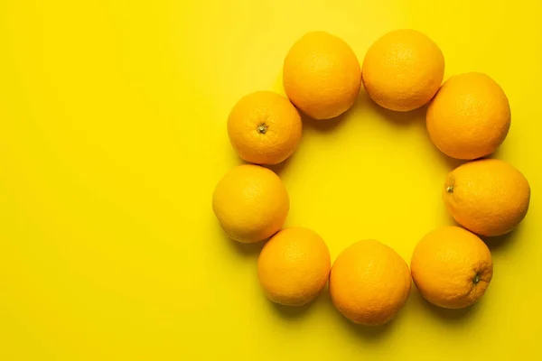 Top View Oranges Frame Shape Yellow Background — Stok fotoğraf