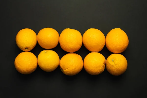 Top View Fresh Oranges Rows Isolated Black — Stok fotoğraf