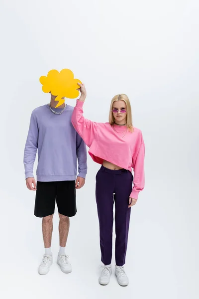 Stylish Model Sunglasses Holding Thought Bubble Boyfriend Grey Background —  Fotos de Stock