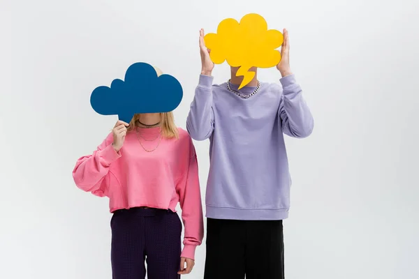 Young Couple Holding Thought Bubbles Faces Isolated Grey — Φωτογραφία Αρχείου