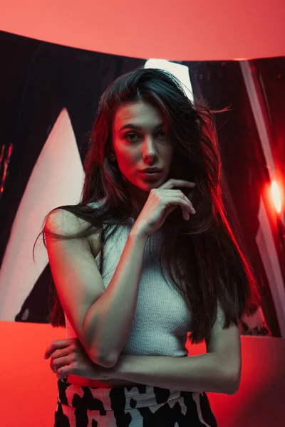 Brunette Young Woman Tank Top Posing Studio Red Backlit — Stock Photo, Image