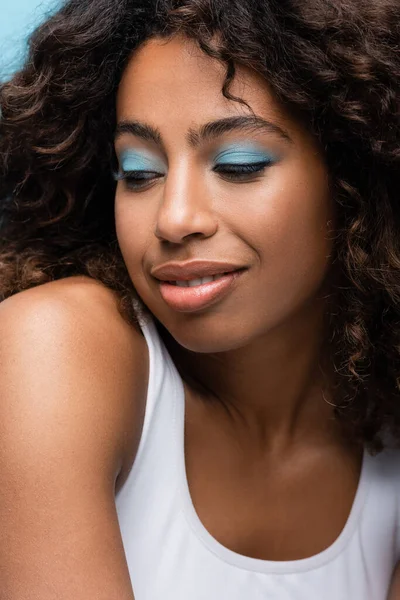 Portrait Smiling African American Woman Perfect Face Blue Eye Shadows — стоковое фото