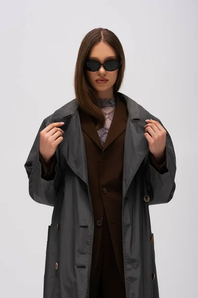 Stylish Teenage Girl Sunglasses Trendy Trench Coat Posing Isolated Grey — Stockfoto