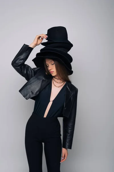 Brunette Model Leather Jacket Holding Derby Hat Isolated Grey — Fotografia de Stock