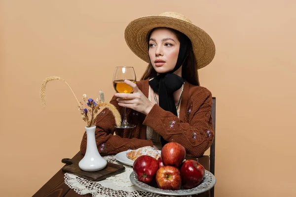 Stylish Woman Sun Hat Holding Wine Food Table Isolated Beige — Stock Photo, Image