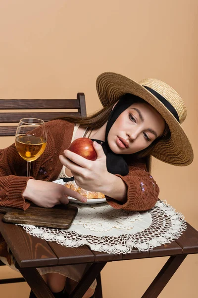 Stylish Woman Sun Hat Holding Apple Wine Croissant Isolated Beige — Stockfoto