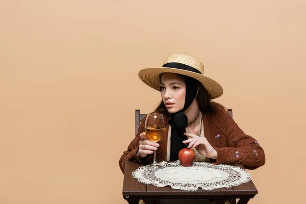 Young Woman Sun Hat Touching Wine Glass Apple Table Isolated — Zdjęcie stockowe