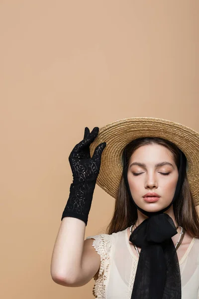 Stylish Woman Vintage Clothes Touching Straw Hat Isolated Beige — Foto de Stock