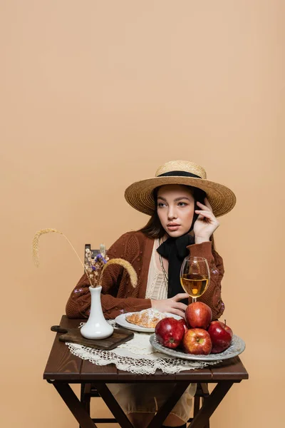 Stylish Model Vintage Clothes Sitting Food Plants Isolated Beige — Foto de Stock