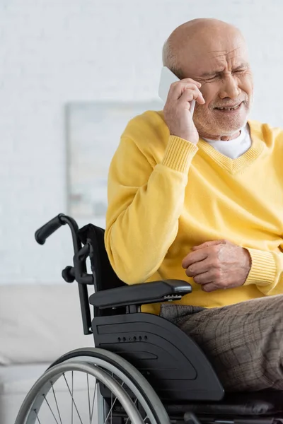 Disappointed Elderly Man Talking Smartphone While Sitting Wheelchair Home — Stock Photo, Image