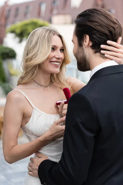 Smiling Woman Touching Boyfriend Engagement Ring Terrace Restaurant — Stock Photo, Image