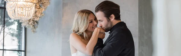 Bearded Man Suit Kissing Hand Smiling Girlfriend Restaurant Banner — Zdjęcie stockowe