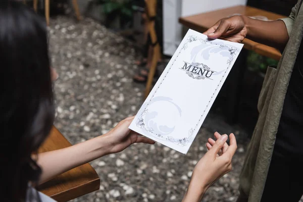 African American Waitress Holding Menu Blurred Client Outdoor Cafe — Photo