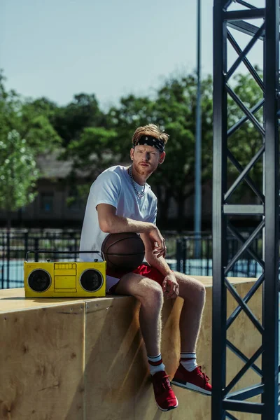 Full Length Man Ball Sitting Boombox Looking Camera — Stok fotoğraf