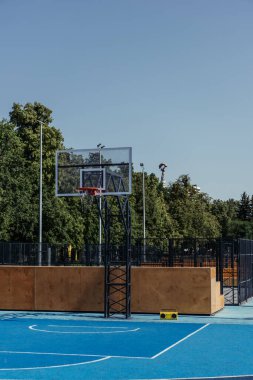 modern court with vintage record player under basketball hoop