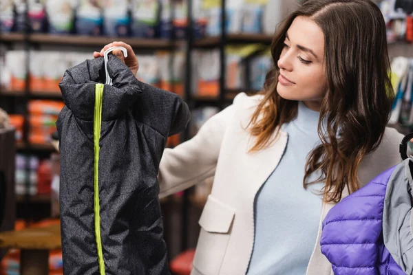 Brunette Woman Holding Animal Jacket Pet Shop — Stock Photo, Image