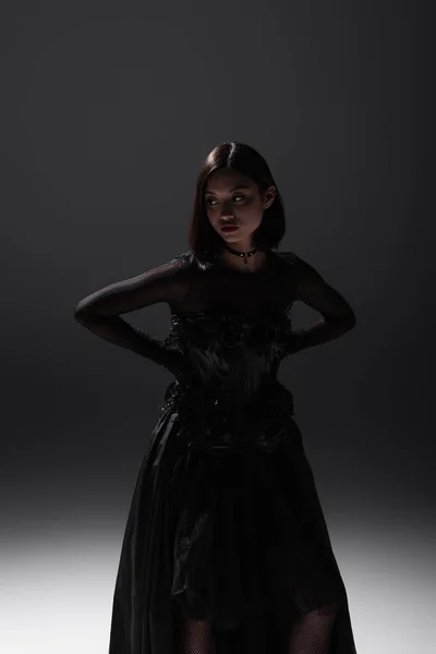 Brunette Asian Model Black Gothic Dress Posing Hands Hips Dark — Foto de Stock