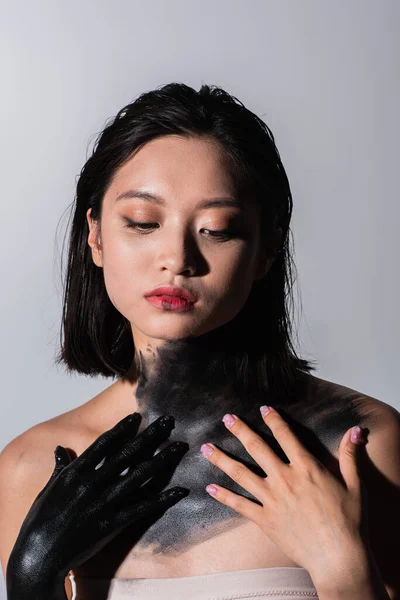 Young Asian Woman Bare Shoulders Body Black Paint Isolated Grey — 스톡 사진