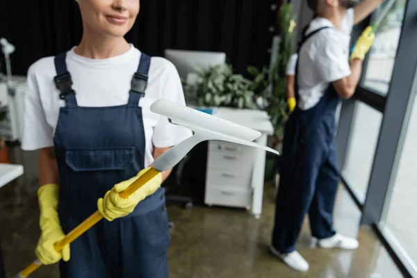 Cropped View Blurred Woman Overalls Holding Window Squeegee Team Working — Stock Photo, Image