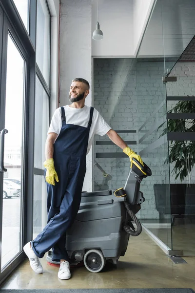 Full Length Smiling Man Workwear Looking Away Professional Floor Scrubber — Stock Photo, Image