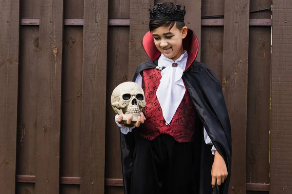 Happy Asian Boy Vampire King Costume Standing Spooky Skull Wooden — Stock Photo, Image